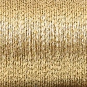 May include: A spool of gold and white metallic thread. The thread is wound tightly around the spool and has a shiny, metallic finish.
