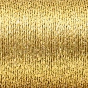 May include: A spool of gold metallic thread.