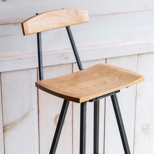 Modern Bar / Kitchen Stool with Back.  Gracefully sculpted wood seat & curved back for comfort coupled with elegant and durable welded base.