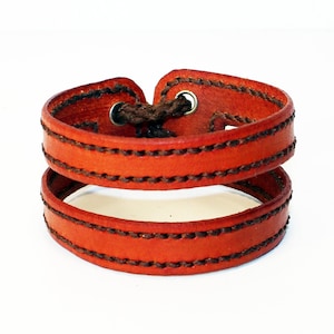 Handmade Orange Leather Cuff Bracelet: Adjustable Unisex Design