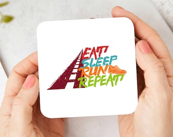 May include: White coaster with a colorful graphic of a road with the words "Eat, Sleep, Run, Repeat" and a running shoe.