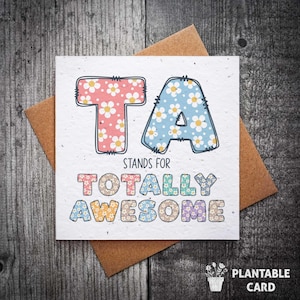 TA sta per "Carta piantabile assolutamente fantastica" / "Carta per assistente insegnante" / "Carta per insegnante" / "Carta di fine trimestre" / "Carta di ringraziamento"