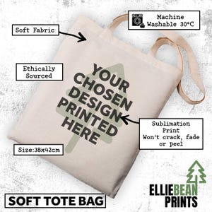 May include: A beige tote bag with two handles, measuring 38x42cm. The bag features a light green tree graphic behind the black text that reads: YOUR CHOSEN DESIGN PRINTED HERE. Labels indicate soft fabric, ethically sourced, and machine washable at 30&deg;C.