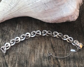 Vintage Monet Silver-Tone Swirl Loop Style Bracelet  (C-9)
