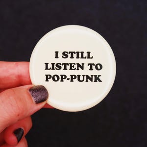I Still Listen To Pop-Punk Button in White 2.25&quot;