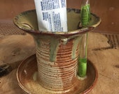 Tooth brush holder