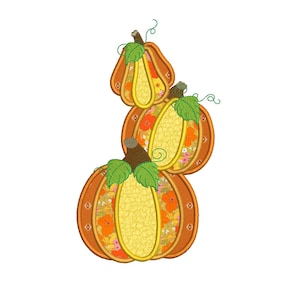 Pode incluir: Três abóboras empilhadas com um padrão floral. As abóboras são laranja, amarela e verde.