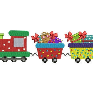 May include: A red and green toy train with a gingerbread person and presents in the carriages. The train has white polka dots and the carriages have colourful polka dots.