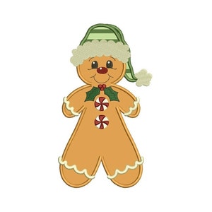 May include: A gingerbread person wearing a green and white striped hat with a white pom-pom. The gingerbread person has red cheeks, a red nose, and a red mouth. The gingerbread person is decorated with green holly leaves and red and white candy canes.