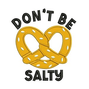 May include: A yellow pretzel with white seeds and the text "Don't Be Salty" in black.