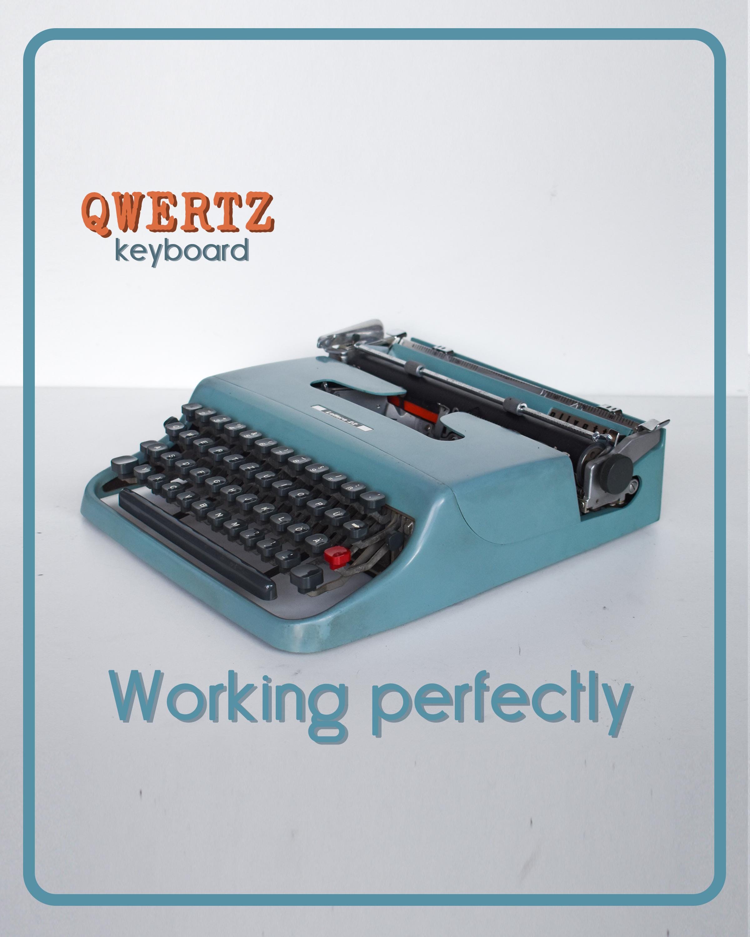 完璧に動作するタイプライター - ブルー Olivetti Lettera 22 - 専門