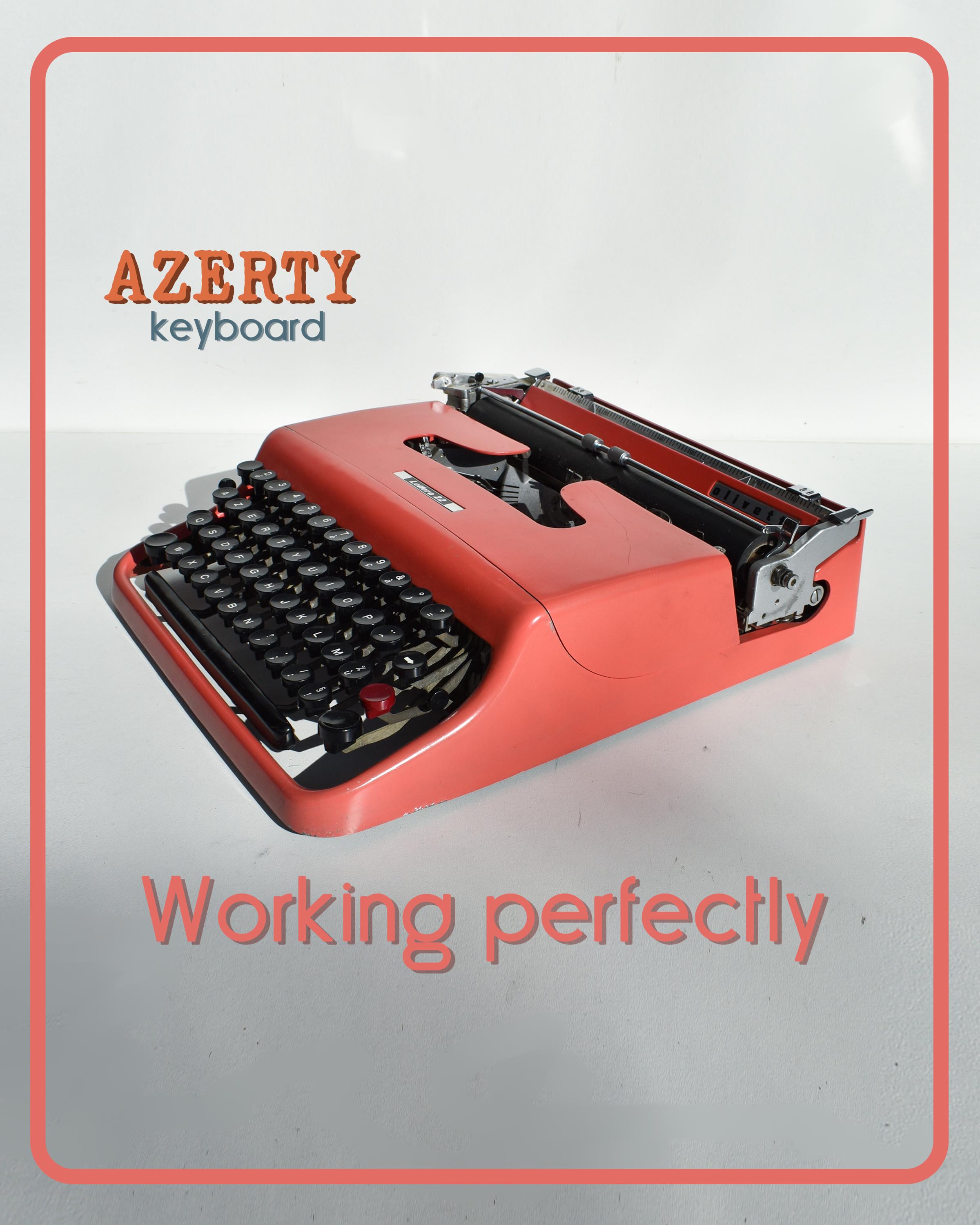 完璧に動作するタイプライター - サーモンピンク Olivetti Lettera 22