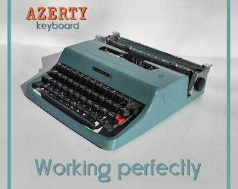 Olivetti Lettera 32 タイプライター、1970 年代ポータブル、新品同様