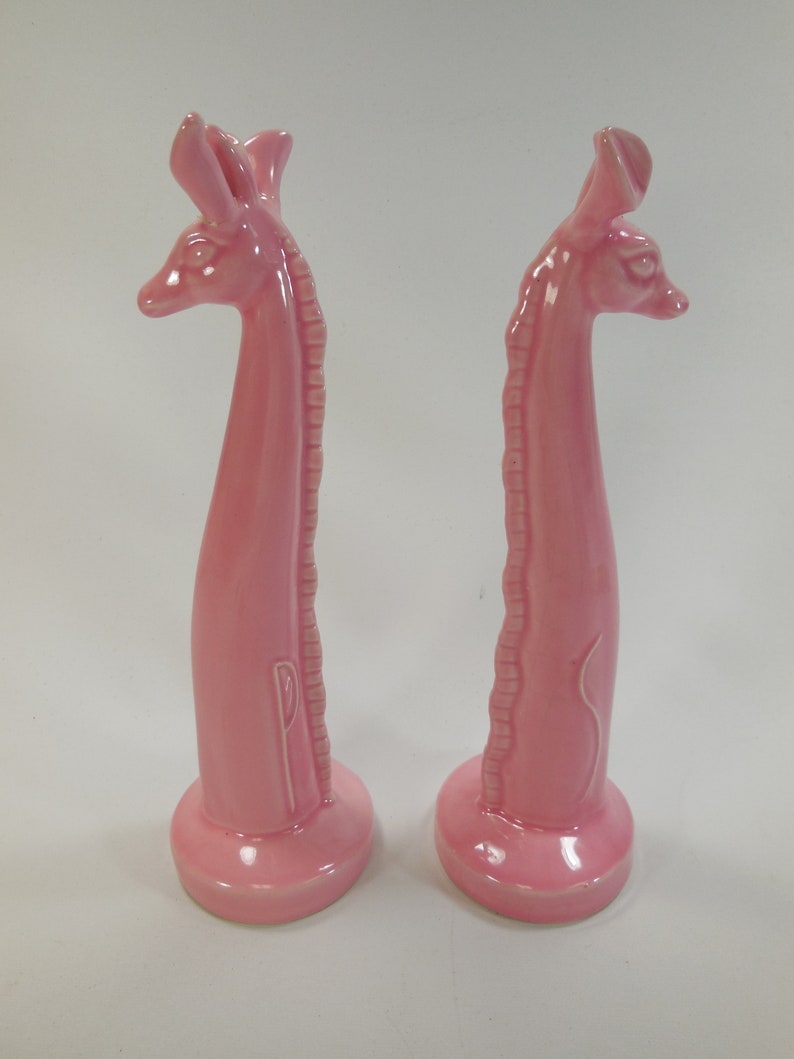 Pair of vintage retro pink ceramic giraffes salt and pepper shakers