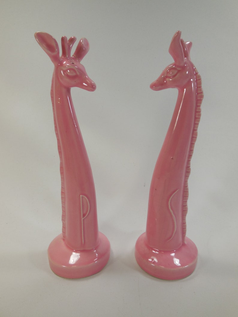 Pair of vintage retro pink ceramic giraffes salt and pepper shakers
