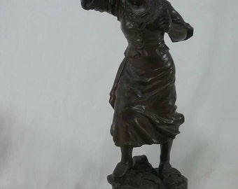 Vintage cast metal Dutch woman sculpture bronze coated statue