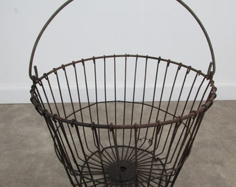 Vintage wire primitive farm egg basket