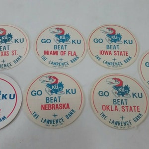 Lot of 7 Vintage go ku jayhawks beat game day unused fabric stickers issued by Lawrence bank kansas basketball football