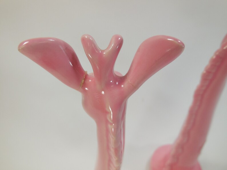 Pair of vintage retro pink ceramic giraffes salt and pepper shakers