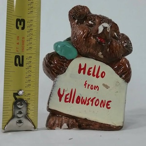 Hello from Yellowstone beat figurine souvenir vintage ceramic chalkware