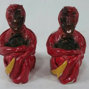 Pair of vintage ceramic devil incense burners