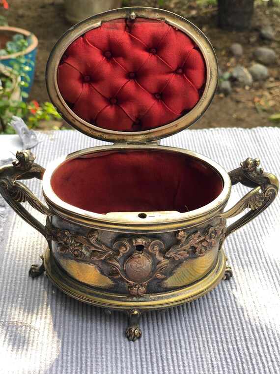 Antique jewelry box. British jewelry box. Red silk