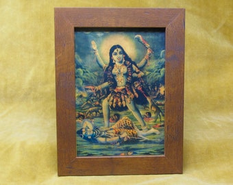 Framed 1990's card of Kali upon Shiva.