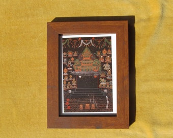 Framed 2000 card of Mount Meru.