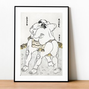 Puede incluir: Dibujo en blanco y negro de dos luchadores de sumo en un combate. Los luchadores están en una posición de lucha, con un luchador encima del otro. El dibujo está sobre un fondo blanco con algunos acentos dorados.
