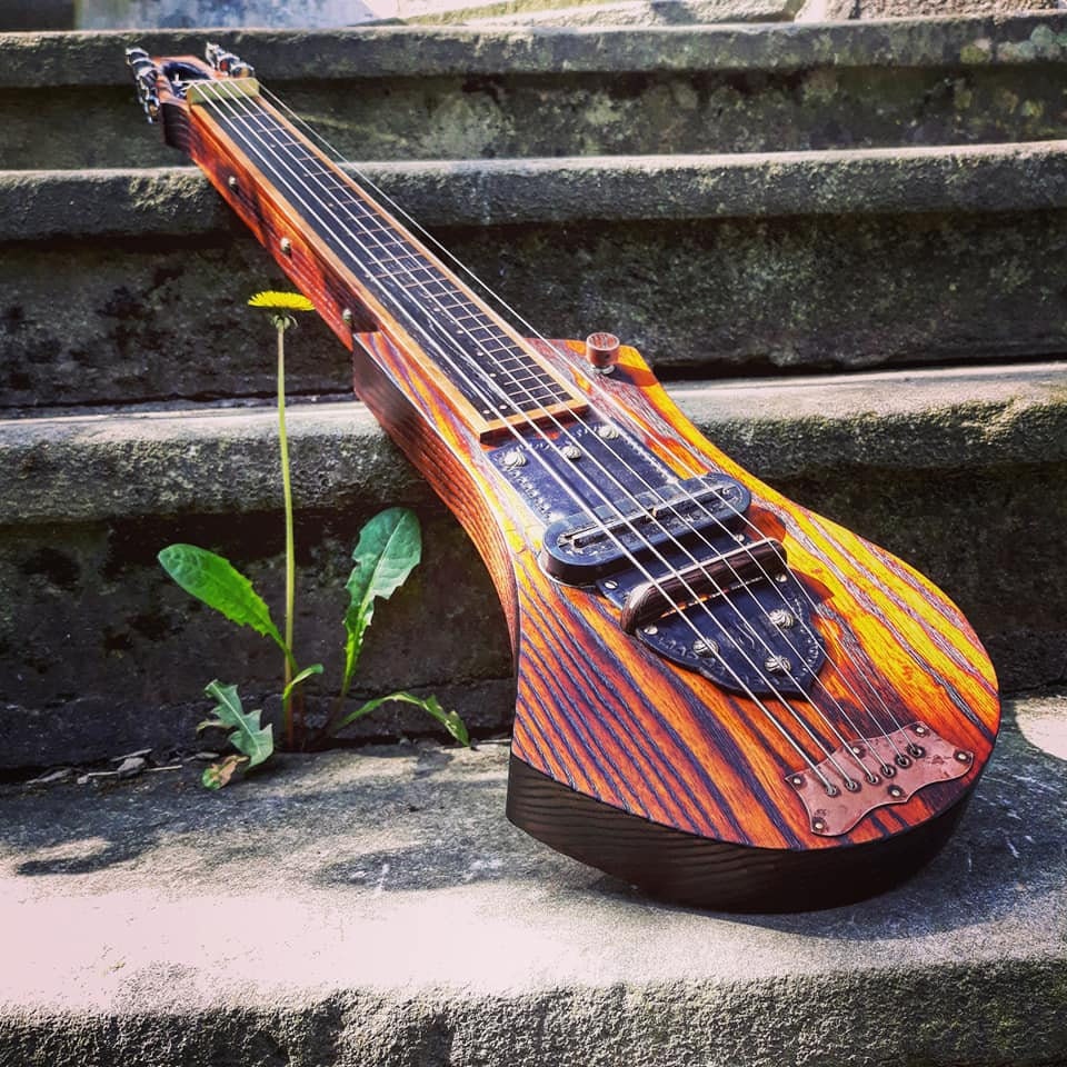 Handcrafted Lapsteel Guitar With a Vintage Pickup. photo