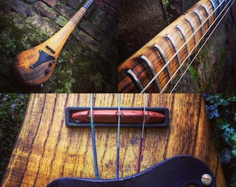 Cellotar by DaShtick guitars - 3 string electric cello with scalloped fretboard.