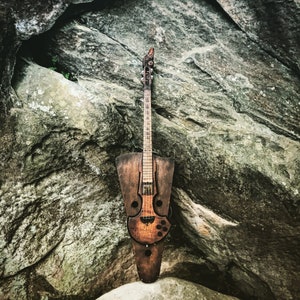 The Raven cellotar/ Fretted cello/ Bowed guitar/ DaShtick cellotar/ Electric cello