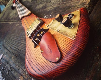 Electric fretted cellotar. 4-string cellotar by DaShtick guitars