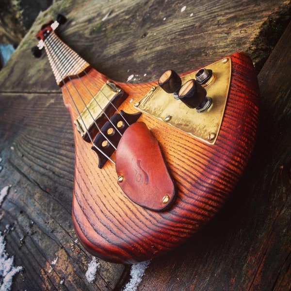 Electric fretted cellotar. 4-string cellotar by DaShtick guitars