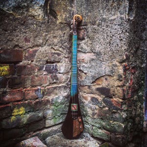 Electric guitar with a humbucker pickup. Handcrafted by DaShtick guitars.