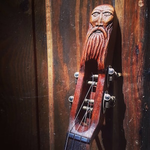 Electric ukulele. Baritone uke with magnetic pickup.