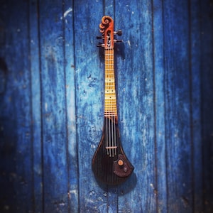 Solid body soprano ukulele by DaShtick guitars. Handcrafted electric ukulele.