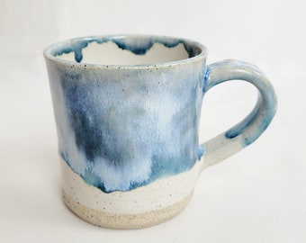 Handmade stoneware coffee mug in oatmeal and grey/blue mottled glazes with drips, 12oz or 350ml coffee cup