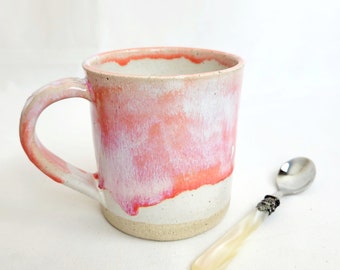 Handmade stoneware coffee mug in oatmeal and salmon pink mottled glazes with drips, 12oz or 350ml coffee cup