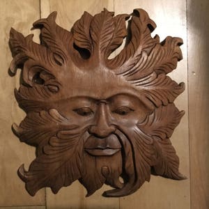 Green man wood carving