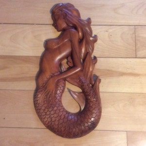 Wood carved mermaid wall hanging