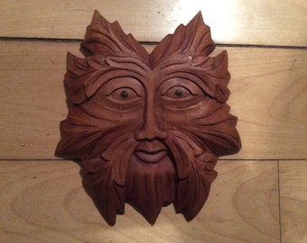Green man wood carving