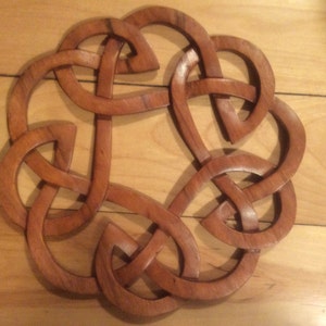 Round celtic knot wood carving