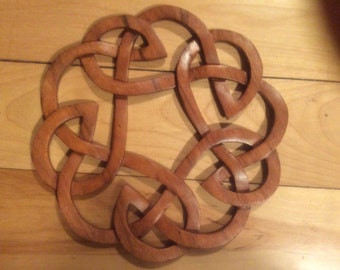 Round celtic knot wood carving