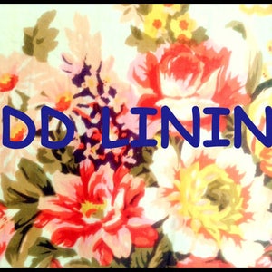 May include: A floral fabric with a white background and a blue text overlay that says "ADD LINING".