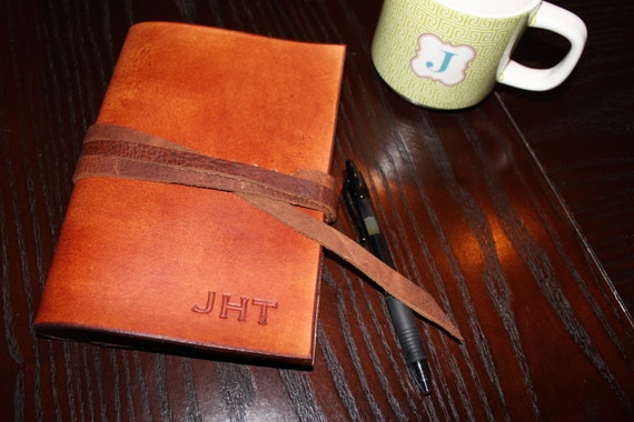 Vegetable-tanned leather that ages beautifully into a one-of-a-kind patina — a refillable monogram journal that gets better every year, not trashed when full.