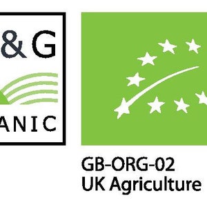 May include: A green and white logo with the text "OF&G Organic" and a stylized green field with a curved line and five green stripes. The logo is next to a green square with a white stylized leaf with 12 white stars around it. The text "GB-ORG-02 UK Agriculture" is below the logos.