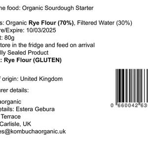 May include: A white label with black text listing the ingredients, storage instructions, and allergens for an organic sourdough starter. The label also includes the name of the food, the best before date, the net weight, the country of origin, and the manufacturer details. A barcode is printed on the right side of the label.