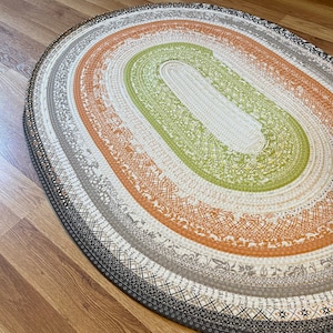 Jelly roll throw rug “ Citrus Sunset” in gray, orange, lime green, and cream