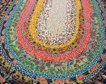 Bright and bold jelly roll rug